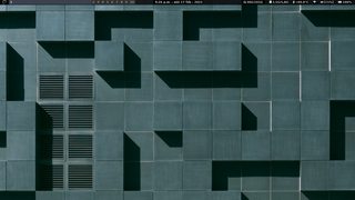 Debian custom button + system tray + clock + executors + battery monitor.